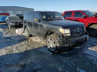2010 Dodge Nitro Heat z VIN 1D4PU4GK9AW161336, wystawiony jako Copart lot #42208095 z przebiegiem 187 470 mil mil oraz Szkoda całkowita • Salvage title. Historia ofert i sprzedaży dostępna na DreamBid. Obrazek 11.