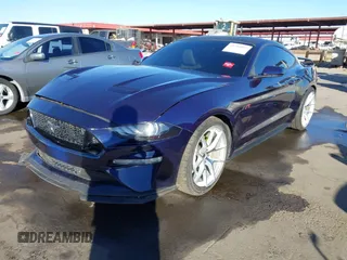 2018 Ford Mustang EcoBoost with VIN 1FA6P8TH9J5166551, listed as a IAAI auction lot 41391819 with 119,739 mi miles and . Bid and sale history available at DreamBid. Image 2.