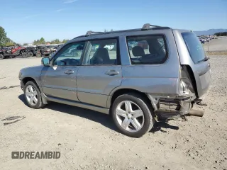 2007 Subaru Forester Sports XT with VIN JF1SG69677H709010, listed as a Copart auction lot 72143004 with 153,460 mi miles and Salvage Title. Bid and sale history available at carsss.com. Image 2.