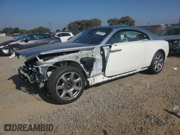 2017 Rolls-Royce Wraith z VIN SCA665C59HUX86762, wystawiony jako Copart lot #82405254 z przebiegiem 10 422 mil mil oraz Szkody całkowita. Historia ofert i sprzedaży dostępna na DreamBid. Obrazek 1.