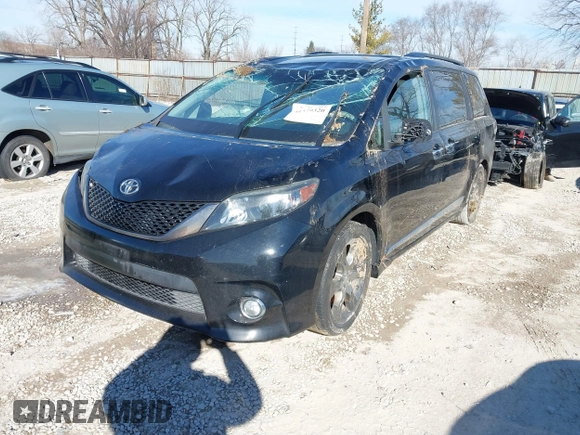 2014 Toyota Sienna SE with VIN 5TDXK3DC3ES521202, listed as a IAAI auction lot 41579320 with 182,982 mi miles and . Bid and sale history available at DreamBid. Image 17.