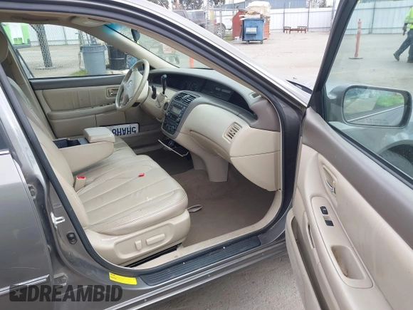 2004 Toyota Avalon XL with VIN 4T1BF28B04U365099, listed as a IAAI auction lot 41500378 with 208,797 mi miles and . Bid and sale history available at DreamBid. Image 5.