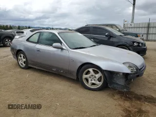 2000 Honda Prelude with VIN JHMBB6248YC001427, listed as a Copart auction lot 54741395 with 198,557 mi miles and Clean Title. Bid and sale history available at DreamBid. Image 4.