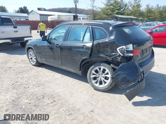 2013 BMW X1 xDrive28i with VIN WBAVL1C59DVR87469, listed as a IAAI auction lot 41775333 with 124,220 mi miles. Bid and sale history available at carsss.com. Image 3.