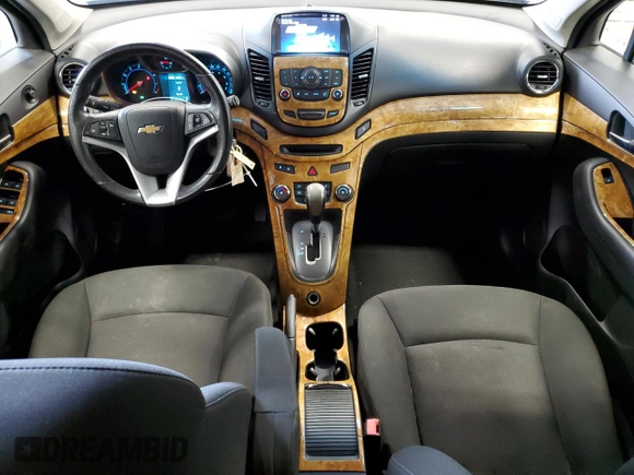 2014 Chevrolet Orlando z VIN KL77P2EK9EK542495, wystawiony jako Copart lot #71786924 z przebiegiem 210 349 mil mil oraz Szkody całkowita. Historia ofert i sprzedaży dostępna na DreamBid. Obrazek 8.