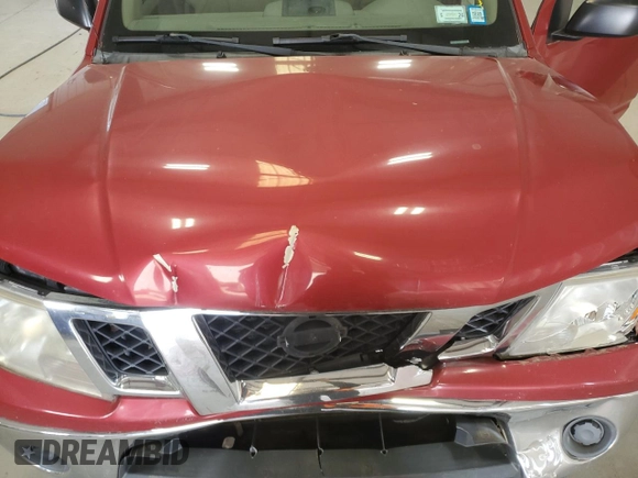 2011 Nissan Frontier Pro-4X with VIN 1N6AD0EV2BC400945, listed as a Copart auction lot 58693635 with 122,209 mi miles and Salvage title. Bid and sale history available at DreamBid. Image 11.
