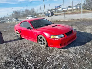 2000 Ford Mustang GT with VIN 1FAFP42X8YF269210, listed as a IAAI auction lot 41578741 with 134,210 mi miles. Bid and sale history available at carsss.com. Image 1.