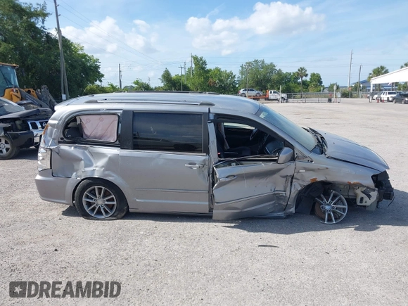 2014 Dodge Grand Caravan SXT with VIN 2C4RDGCG3ER193688, listed as a IAAI auction lot 41290544 with 73,092 mi miles and . Bid and sale history available at DreamBid. Image 14.