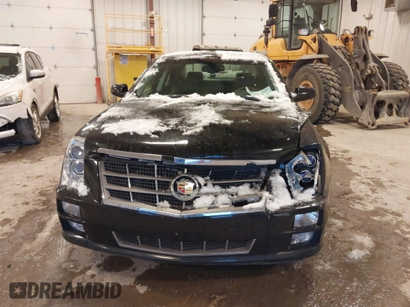 2010 Cadillac STS AWD with VIN 1G6DU6EV2A0125065, listed as a IAAI auction lot 41229886 with 84,954 mi miles and . Bid and sale history available at DreamBid. Image 13.