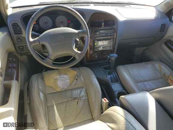 2000 Infiniti QX4 with VIN JNRAR07Y4YW085424, listed as a Copart auction lot 81091324 with 202157 miles and Salvage Title. Bid and sale history available at carsss.com. Image 8.
