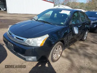 2010 Ford Focus SEL with VIN 1FAHP3HN4AW231889, listed as a IAAI auction lot 41901822 with 129,450 mi miles. Bid and sale history available at carsss.com. Image 2.