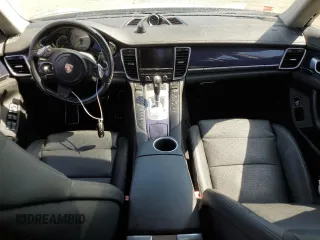 2014 Porsche Panamera S E-Hybrid z VIN WP0AD2A78EL044818, wystawiony jako Copart lot #65864484 z przebiegiem 141 423 mil mil oraz Szkoda całkowita • Salvage title. Historia ofert i sprzedaży dostępna na DreamBid. Obrazek 8.