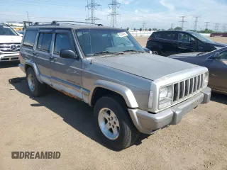 2001 Jeep Cherokee Sport z VIN 1J4FF58S61L540796, wystawiony jako Copart lot #62384895 z przebiegiem 209 294 mil mil oraz Czysty tytuł • Clean title. Historia ofert i sprzedaży dostępna na DreamBid. Obrazek 4.