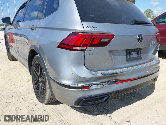 2022 Volkswagen Tiguan SE R-Line Black z VIN 3VV8B7AX3NM168318, wystawiony jako IAAI lot #41530361 z przebiegiem 31 226 mil mil oraz . Historia ofert i sprzedaży dostępna na DreamBid. Obrazek 6.
