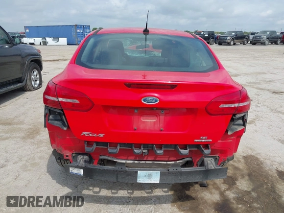 2015 Ford Focus SE z VIN 1FADP3F23FL233620, wystawiony jako IAAI lot #42073204 z przebiegiem 129 109 mil mil oraz . Historia ofert i sprzedaży dostępna na DreamBid. Obrazek 16.