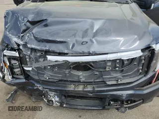 2022 Ford F-150 Lightning Pro z VIN 1FT6W1EV7NWG10601, wystawiony jako Copart lot #55057445 z przebiegiem Nie podano mil oraz Szkoda całkowita • Salvage title. Historia ofert i sprzedaży dostępna na DreamBid. Obrazek 11.