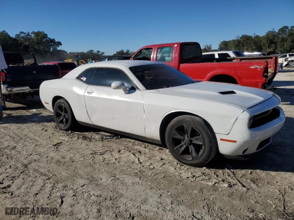 2016 Dodge Challenger SXT Plus with VIN 2C3CDZAG7GH245714, listed as a Copart auction lot 87742125 with 67,159 mi miles and Salvage Title. Bid and sale history available at carsss.com. Image 4.