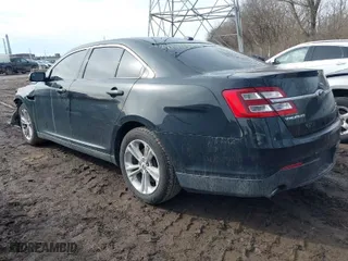 2014 Ford Taurus SEL with VIN 1FAHP2E88EG149396, listed as a IAAI auction lot 41489410 with 190,648 mi miles. Bid and sale history available at carsss.com. Image 3.
