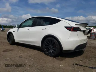 2022 Tesla Model Y Performance z VIN 7SAYGDEF4NF389191, wystawiony jako Copart lot #61443135 z przebiegiem 70 612 mil mil oraz Szkoda całkowita • Salvage title. Historia ofert i sprzedaży dostępna na DreamBid. Obrazek 2.