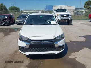 2019 Mitsubishi Outlander Sport ES 2.0 with VIN JA4AP3AUXKU028722, listed as a IAAI auction lot 41875610 with 71,728 mi miles. Bid and sale history available at carsss.com. Image 13.