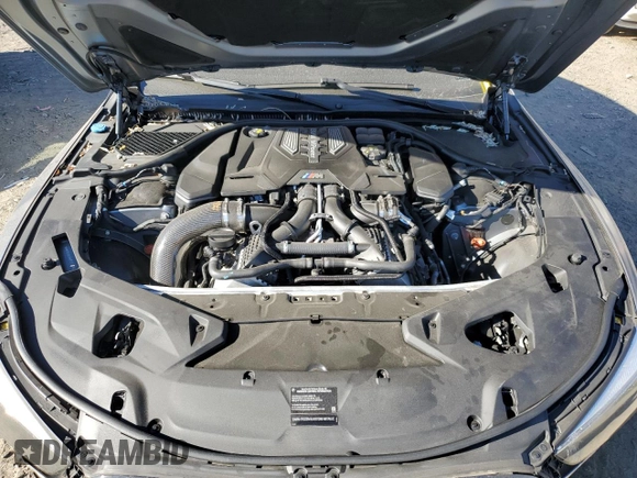 2022 BMW M8 Competition z VIN WBSGV0C08NCK26720, wystawiony jako Copart lot #78250474 z przebiegiem Nie podano mil oraz Szkoda całkowita • Salvage title. Historia ofert i sprzedaży dostępna na DreamBid. Obrazek 11.