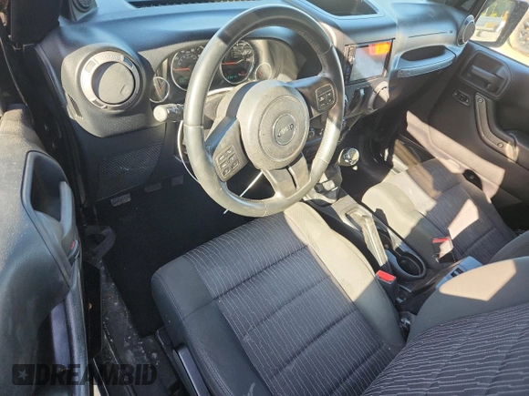 2012 Jeep Wrangler Sport with VIN 1C4AJWAG5CL273292, listed as a Copart auction lot 60135395 with 123,874 mi miles and Salvage title. Bid and sale history available at DreamBid. Image 8.