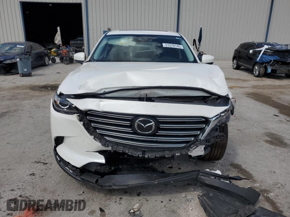 2023 Mazda CX-9 Touring z VIN JM3TCBCY6P0647537, wystawiony jako Copart lot #51578145 z przebiegiem 51 316 mil mil oraz Nie do naprawy • Non repairable. Historia ofert i sprzedaży dostępna na DreamBid. Obrazek 5.