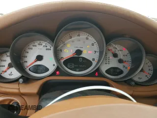 2007 Porsche 911 Carrera S with VIN WP0CB29997S777375, listed as a Copart auction lot 65143554 with 53,525 mi miles and Salvage Title. Bid and sale history available at carsss.com. Image 9.