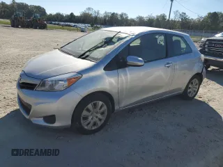 2014 Toyota Yaris L with VIN JTDJTUD31ED588546, listed as a Copart auction lot 74899274 with 65,254 mi miles and Salvage Title. Bid and sale history available at carsss.com. Image 1.