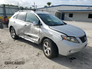 2010 Lexus RX 350 with VIN 2T2BK1BA7AC001406, listed as a Copart auction lot 63128955 with 220,634 mi miles and Salvage title. Bid and sale history available at DreamBid. Image 4.