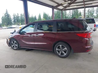 2019 Honda Odyssey Touring z VIN 5FNRL6H88KB030847, wystawiony jako IAAI lot #42433312 z przebiegiem Nie podano mil oraz . Historia ofert i sprzedaży dostępna na DreamBid. Obrazek 13.