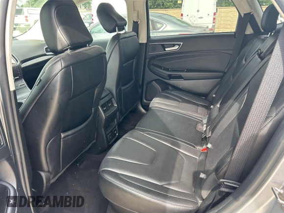 2020 Ford Edge Titanium z VIN 2FMPK3K95LBA30633, wystawiony jako IAAI lot #42473515 z przebiegiem 104 190 mil mil oraz . Historia ofert i sprzedaży dostępna na DreamBid. Obrazek 1.