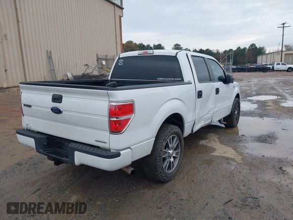 2014 Ford F-150 XL with VIN 1FTFW1CF8EFA66332, listed as a IAAI auction lot 41033667 with 200,513 mi miles. Bid and sale history available at carsss.com. Image 4.