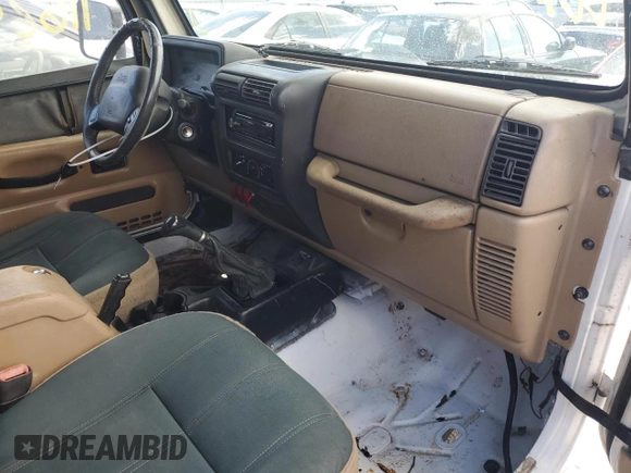 2001 Jeep Wrangler Sahara with VIN 1J4FA59S31P334308, listed as a Copart auction lot 77984464 with 116,293 mi miles and Salvage Title. Bid and sale history available at carsss.com. Image 8.