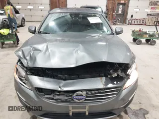 2016 Volvo S60 T5 Premier z VIN YV1612TK0G2410743, wystawiony jako IAAI lot #41717318 z przebiegiem 87 087 mil mil oraz . Historia ofert i sprzedaży dostępna na DreamBid. Obrazek 12.