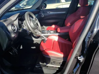 2024 Alfa Romeo Stelvio Ti z VIN ZASPAKBNXR7D70884, wystawiony jako Copart lot #87212794 z przebiegiem 15 162 mil mil oraz Szkoda całkowita • Salvage title. Historia ofert i sprzedaży dostępna na DreamBid. Obrazek 7.