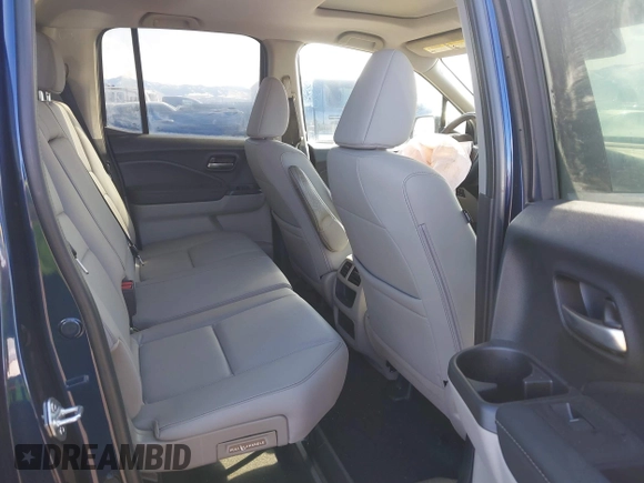2022 Honda Ridgeline RTL-E with VIN 5FPYK3F71NB013522, listed as a IAAI auction lot 41670347 with 24,689 mi miles and . Bid and sale history available at DreamBid. Image 8.