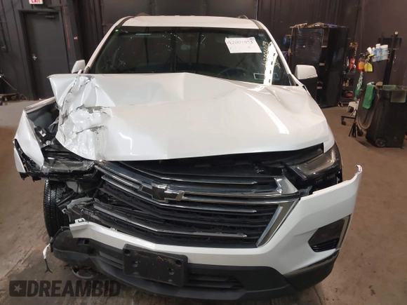 2023 Chevrolet Traverse LT Cloth with VIN 1GNEVGKW4PJ332410, listed as a IAAI auction lot 42001073 with 23,453 mi miles and . Bid and sale history available at DreamBid. Image 6.