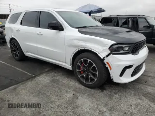 2021 Dodge Durango SRT Hellcat with VIN 1C4SDJH97MC605837, listed as a Copart auction lot 76390414 with 35,876 mi miles and Salvage Title. Bid and sale history available at DreamBid. Image 4.