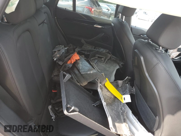 2021 BMW X1 xDrive28i with VIN WBXJG9C09M5S52289, listed as a Copart auction lot 64413105 with Not provided miles and Salvage title. Bid and sale history available at DreamBid. Image 10.