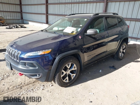 2015 Jeep Cherokee Trailhawk with VIN 1C4PJMBB1FW520649, listed as a IAAI auction lot 41991904 with 168,533 mi miles and . Bid and sale history available at DreamBid. Image 2.