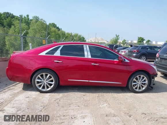 2013 Cadillac XTS Luxury z VIN 2G61P5S34D9139924, wystawiony jako IAAI lot #42504191 z przebiegiem 140 744 mil mil oraz . Historia ofert i sprzedaży dostępna na DreamBid. Obrazek 13.