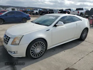 2014 Cadillac CTS Performance with VIN 1G6DG1E35E0190085, listed as a Copart auction lot 84347104 with 142,720 mi miles and Salvage title. Bid and sale history available at DreamBid. Image 1.