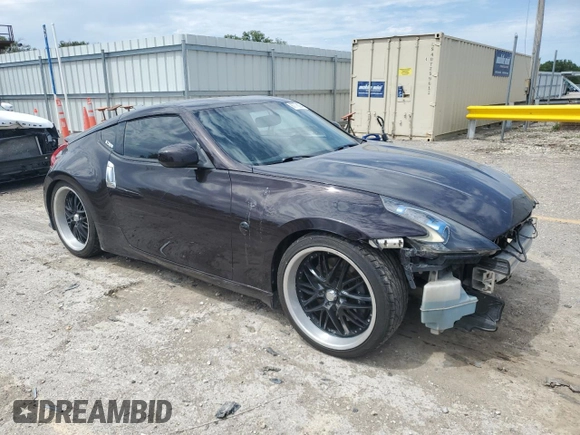 2010 Nissan 370Z Touring with VIN JN1AZ4EH1AM504571, listed as a Copart auction lot 67776294 with 56,166 mi miles and Salvage Title. Bid and sale history available at carsss.com. Image 4.