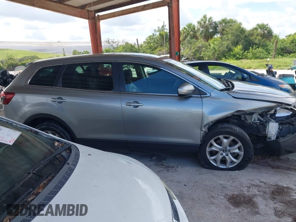 2015 Mazda CX-9 Sport with VIN JM3TB2BA0F0447436, listed as a IAAI auction lot 42480482 with 127,557 mi miles and . Bid and sale history available at DreamBid. Image 13.
