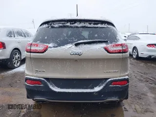 2015 Jeep Cherokee Limited z VIN 1C4PJMDS5FW623361, wystawiony jako IAAI lot #40920356 z przebiegiem 110 989 mil mil oraz . Historia ofert i sprzedaży dostępna na DreamBid. Obrazek 16.