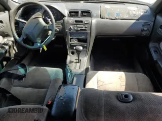 1999 Nissan Maxima GXE z VIN JN1CA21D9XM409448, wystawiony jako Copart lot #51822895 z przebiegiem Nie podano mil oraz Szkoda całkowita • Salvage title. Historia ofert i sprzedaży dostępna na DreamBid. Obrazek 8.