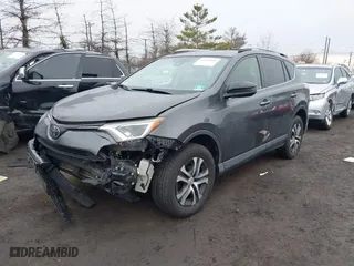 2018 Toyota RAV4 LE with VIN JTMBFREV0JJ223957, listed as a IAAI auction lot 41652810 with 144,629 mi miles. Bid and sale history available at carsss.com. Image 17.