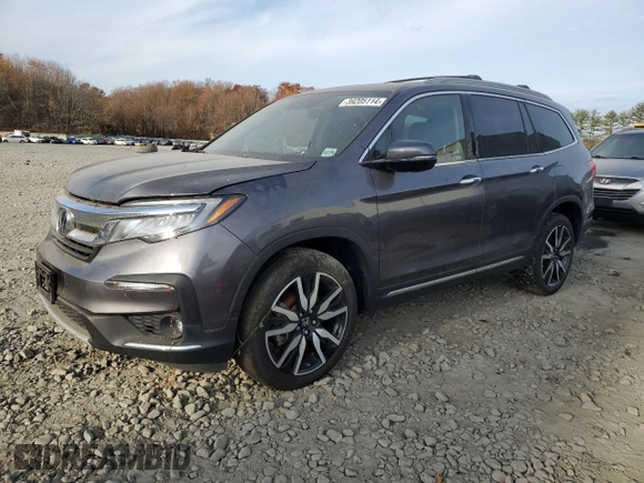 2021 Honda Pilot Elite with VIN 5FNYF6H04MB035043, listed as a Copart auction lot 39205114 with 35,870 mi miles and Salvage Title. Bid and sale history available at carsss.com. Image 1.