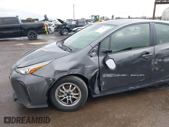 2021 Toyota Prius L Eco with VIN JTDKAMFUXM3143646, listed as a IAAI auction lot 41507110 with 207,238 mi miles. Bid and sale history available at carsss.com. Image 6.